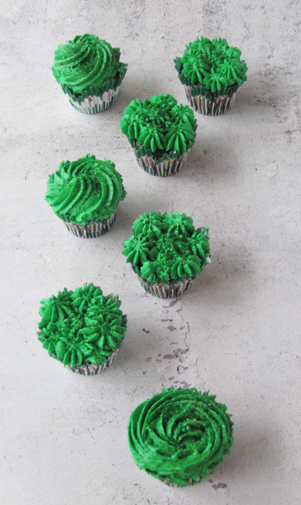 Baileys Irish cream chocolate cupcakes with sprinkles and green frosting