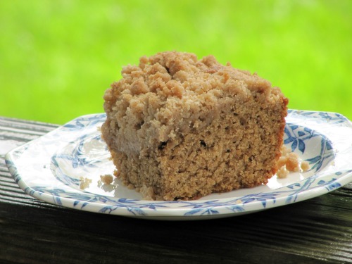 Crumb Lovers coffee cake on a blue and white plate.