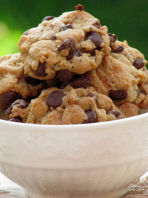 chocolate chip cookies in a white bowl. 