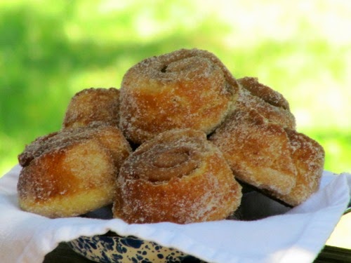 morning-buns in a white napkin lined speckled bowl. 