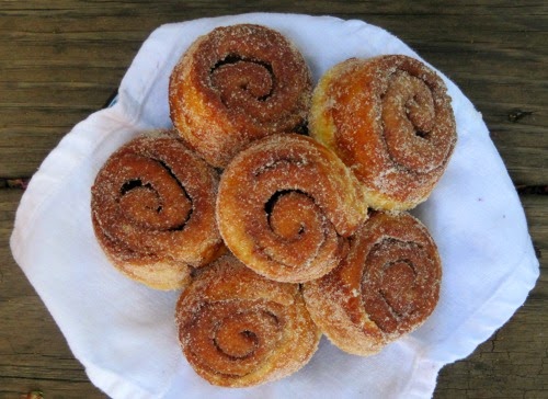 Morning buns in white basket. 