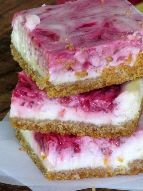 Three Lemon Raspberry Swirled Cheesecake Bars. 