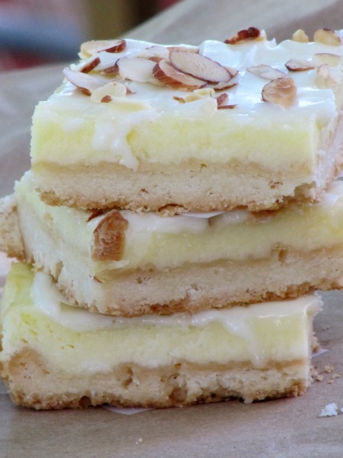 almond-cheesecake-bars-on a stack