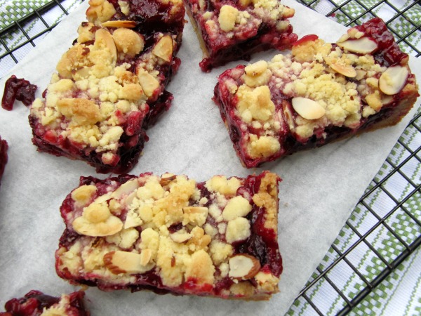 Cherry Almond Crumble bars on a wire rack. 