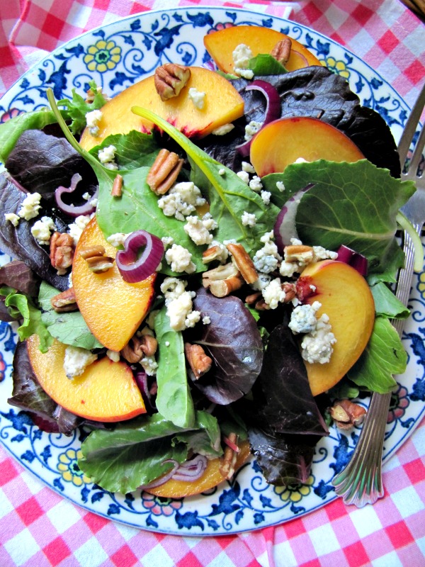 summer peach salad on a platter.