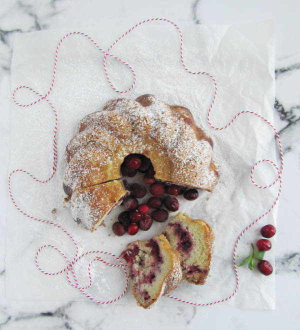 cranberry bundt cake with two slices.