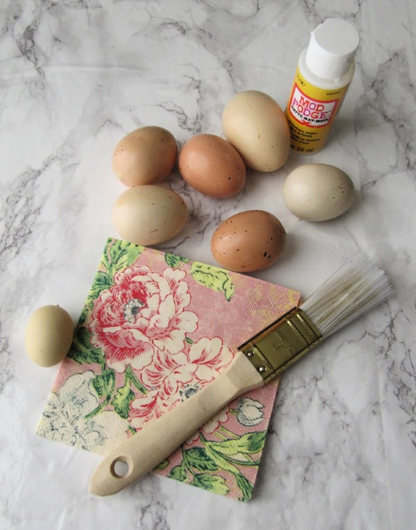 Mod Podge eggs napkin and a paint brush