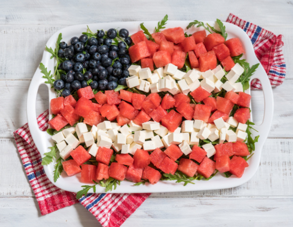 Fruit flag with watermelon, blueberries and cheese.