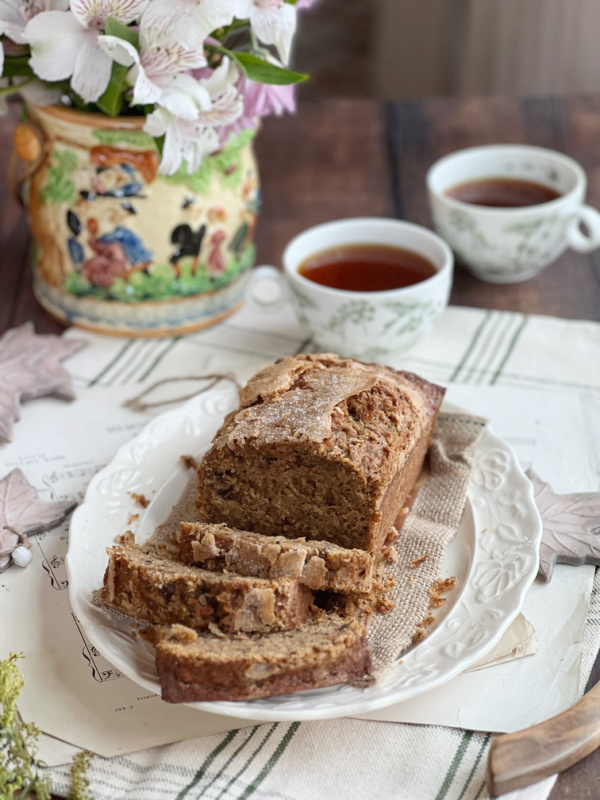 pumpkin Zucchini nut bread with 2 cups of tea.