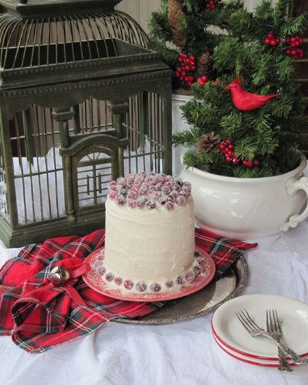 White Cake with Cranberry Jam Filling White Buttercream and Sugared Cranberries