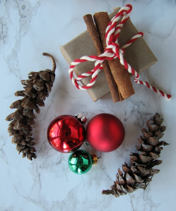 Brown paper packages-pinecones and christmas ornaments