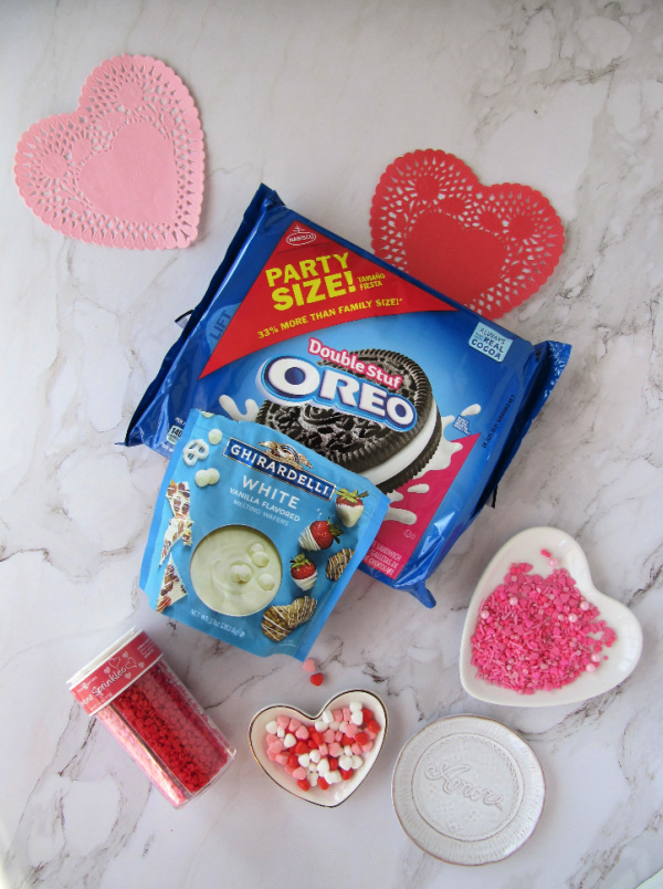 Package of Oreo Cookies, white chocolate Ghiradelli melting wafers and assorted trays of colorful sprinkles
