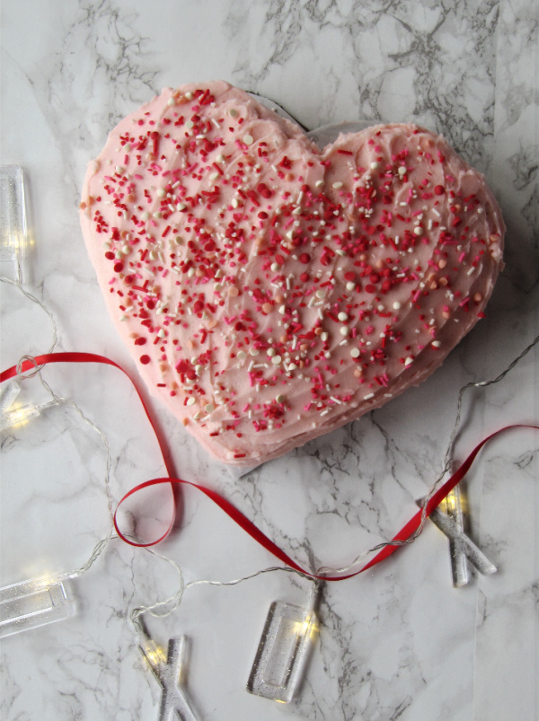 Easy heart shaped cake made with standard cake pans. 10 Easy Valentine's Day Desserts