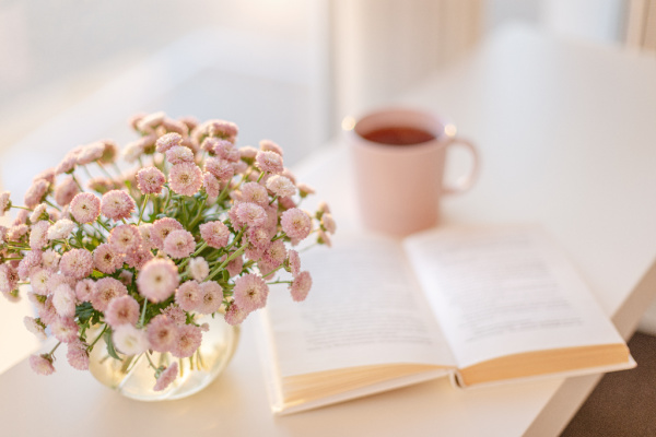 pink flowers and a book