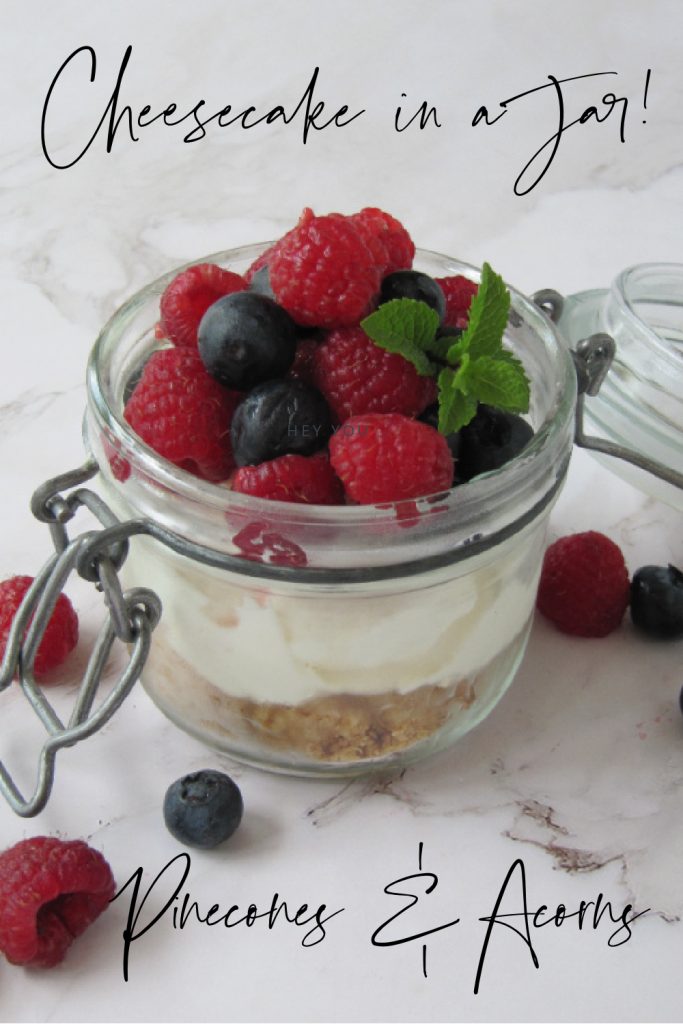 No-bake cheesecake in a jar with summer berries. 