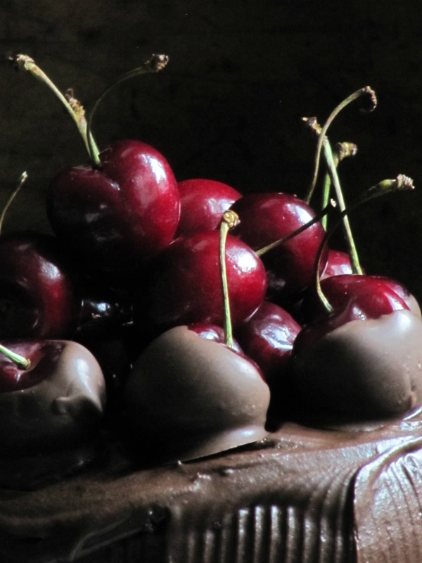 Chocolate Cake Filled with Cherries and Topped with Chocolate Covered Cherries