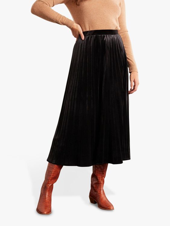 black velvet skirt with tan riding boots