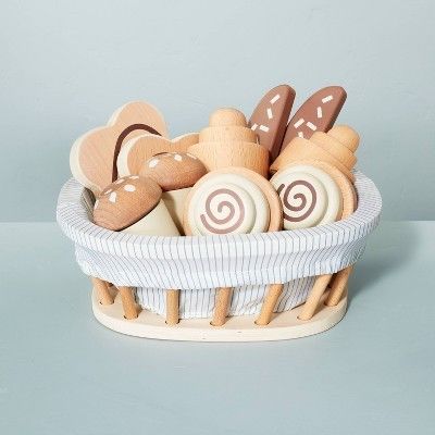 wood basket filled with wood pastries 