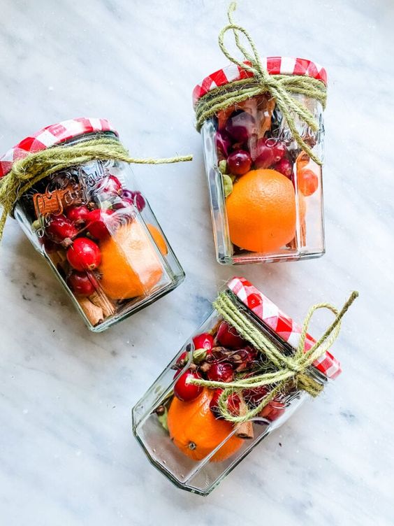 jar filled with oranges spices and more homemade poppuori