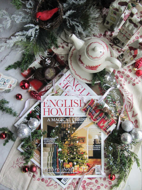 English Home UK magazine Christmas flatly with christmas ornaments and greens
