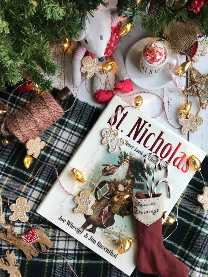 St. Nicholas book, small mouse stuffed animal flatlay