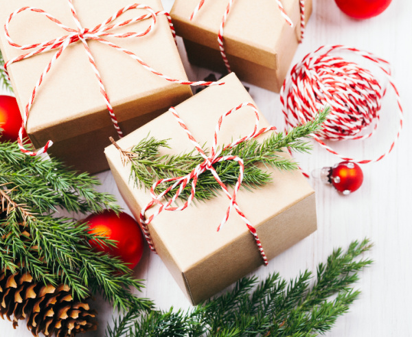 brown paper packages tied up with red and white twine
