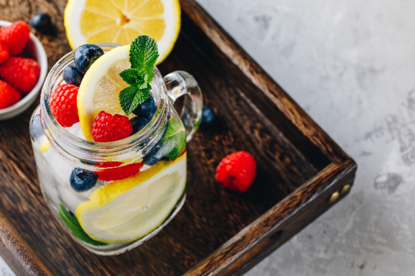 blueberry and mint. Ice cold summer cocktail or lemonade in glass mason jar