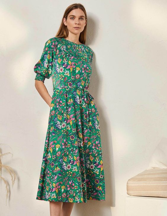 Woman in a green flowered dress Boden