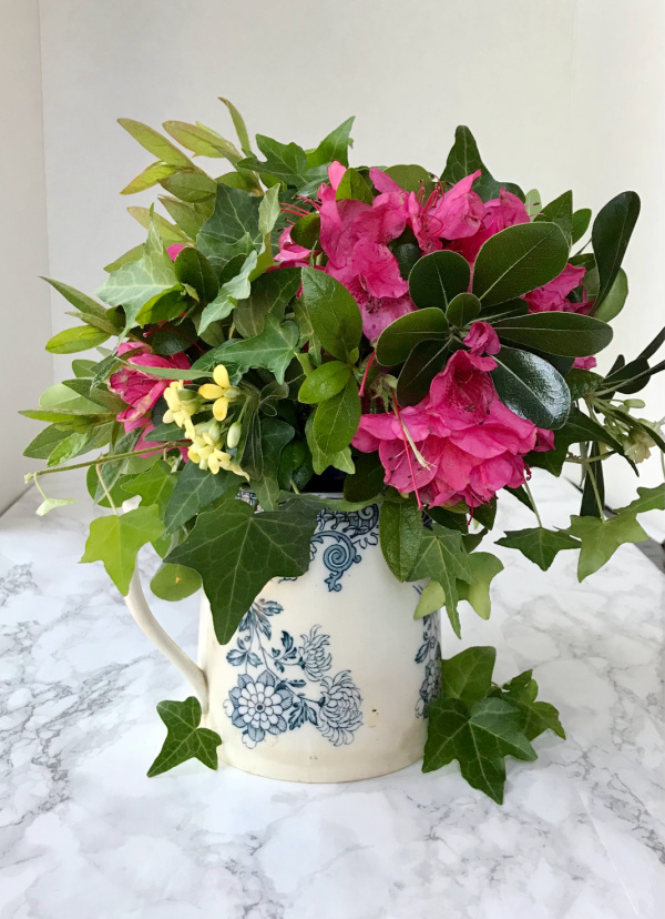 flowers in blue and white ironstone pitcher