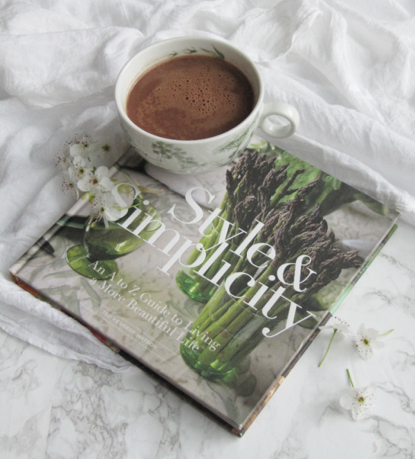 Friday Favorites Style and Simplicity Book By Watson Kennedy with a cup of hot chocolate