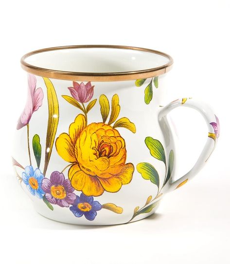 white mug with colorful flowers