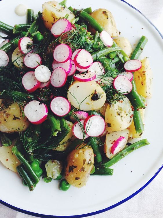 Colorful spring potato salad with radish