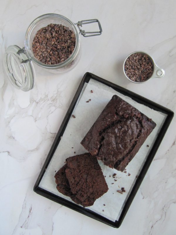 double chocolate banana bread and a jar of cocoa nibs