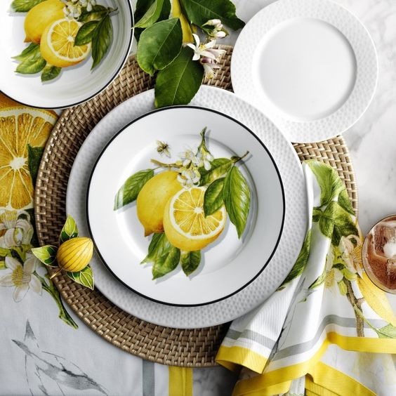 table setting with lemon plate and napkins