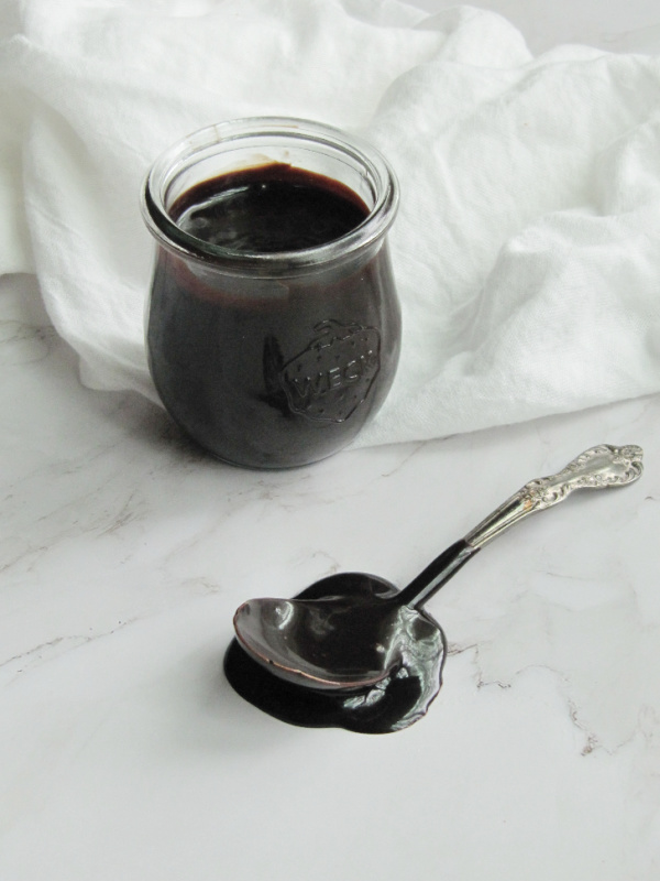 weck jar filled with hot fudge