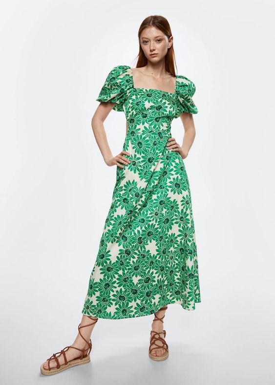 girl in a green and white flower dress