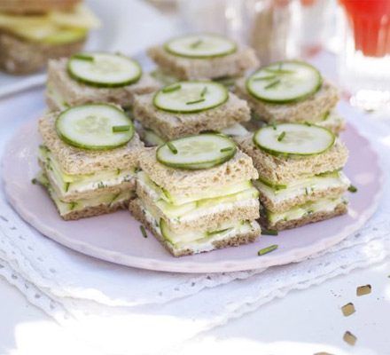 cucumber sandwiches on a white plate