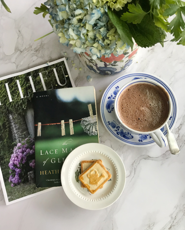 flatlay Milieu magazine a book cookies flowers and hot chocolate-2