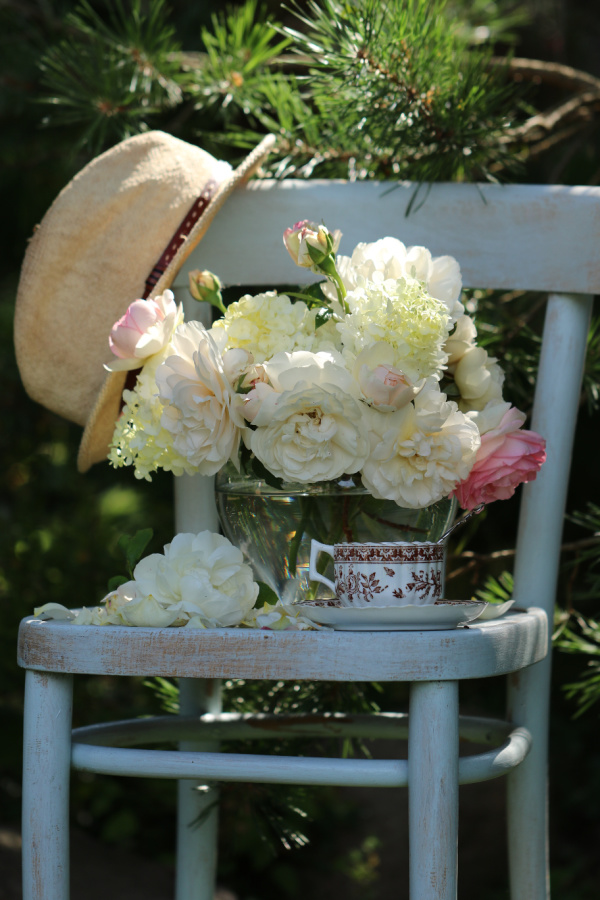 summer flowers on a blue chair
