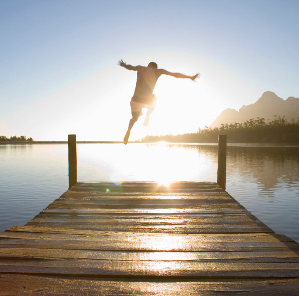 summer fun jumping off the dock