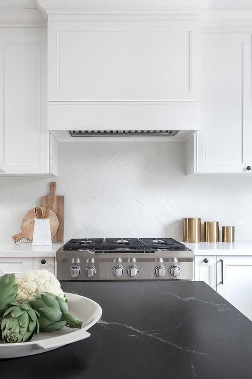 White kitchen with a black counter