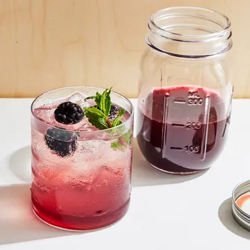 weekend meanderings mason jar of red liquid and a cocktail 