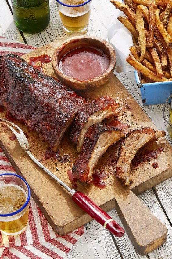 weekend meanderings rack of ribs and French fries on a wood cutting board