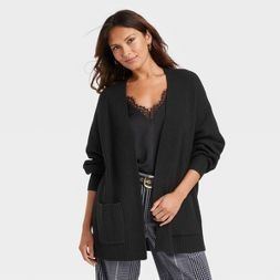 woman wearing a black cardigan sweater