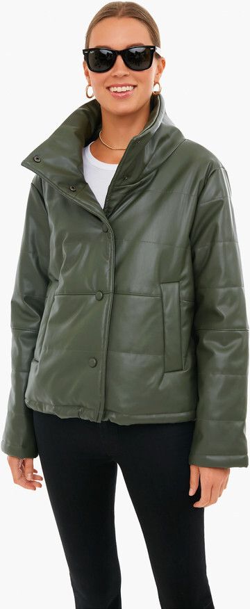 Friday Favorites Woman with glasses a green leather Tuckernuck leather jacket