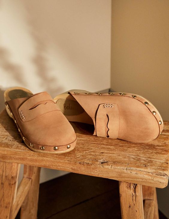 weekend meanderings tan clogs on a wood bench
