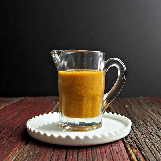 honey lemon vinaigrette in a pitcher