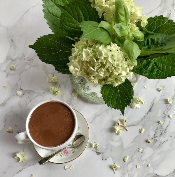 flatlay hydrangeas and hot chocolate