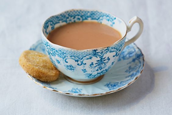 English tea and biscuit in a blue and white cup