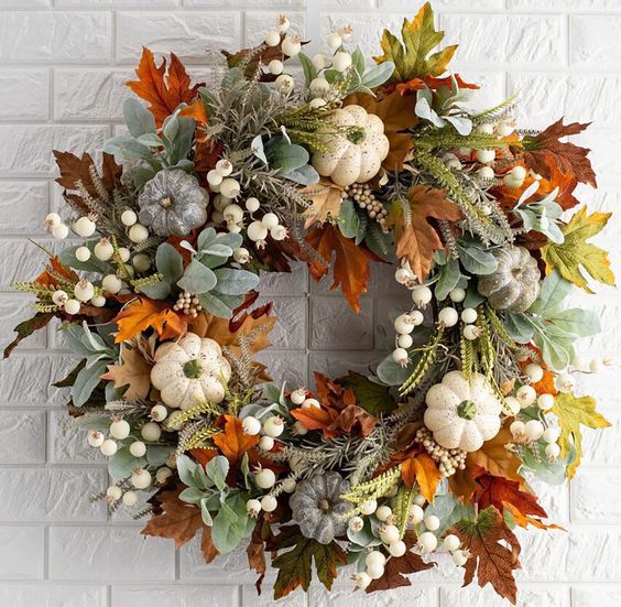 fall wreath with leaves and pumpkins